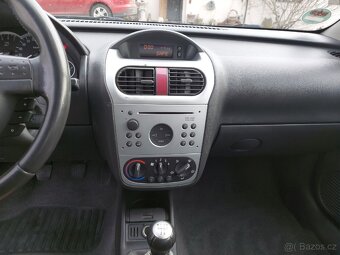 Opel Corsa 1.2i - 13