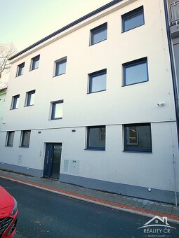 Novostavba domu s osmi byty a parkováním - 13