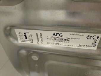 Pračka AEG s vrchním plněním a párou - 13