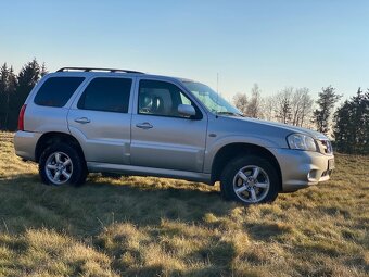 Mazda Tribute 2,3 - 13