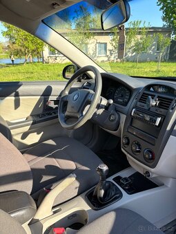 KIA CERATO 2006 - 13