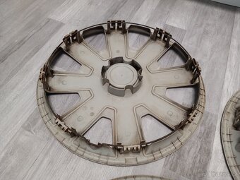 Poklice Ford, 4M51-1000-EB - 13