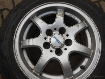 ALU KOLA +ZIMNÍ PNEU 165/70R14 BARUM POLARIS 5 OBUTE FÁBIA 1 - 13