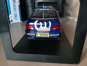 Subaru, Opel, Fiat a Ford    1:18   IXO - 13