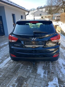 Hyundai Tucson.ix35 2.0 crdi 4x4 - 13