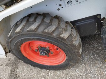 Šmykový nakladač Bobcat S100, TP. - 13