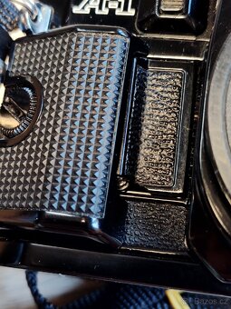 Canon A-1 + FD 28mm + příslušenství - 13