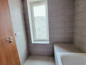 Prodej nového bytu 2+kk s garážovým stáním a sklepem - Praha - 13