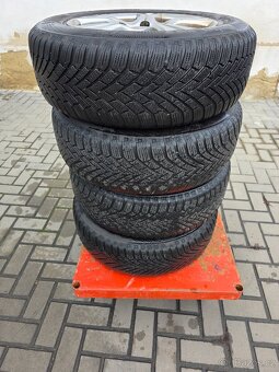 Zimní sada Continental 195/65 R15 na disku 6,5Jx15H2 ET45 - 13