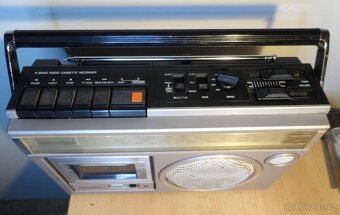 PHILIPS D8130. Panasonic RX-1650LS - 13