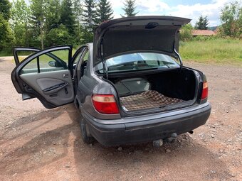 Almera 1.5 benzín 2002 - 13