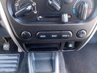 Suzuki Jimny 1.3 JLX AC 09/2014  SK ŠPZ - 13
