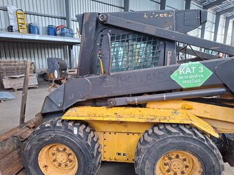 NEW HOLLAND LS 180 - 13