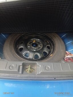 Suzuki ignis 1.3 16v r.v. 2003 - 13