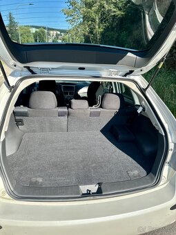 Subaru Impreza 2.0R - 13