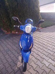 Elektrický moped - 13
