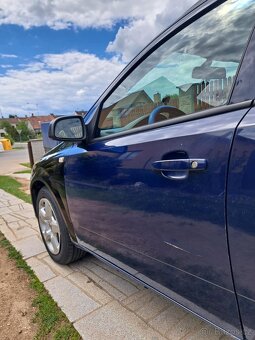 Opel Astra H combi - 13