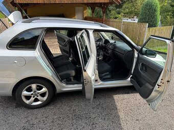 Fabia 2 kombi 1.2tsi klimatronik alu tempomat edice family - 13