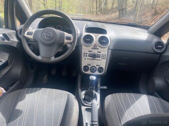 Opel Corsa 1.2i - 13
