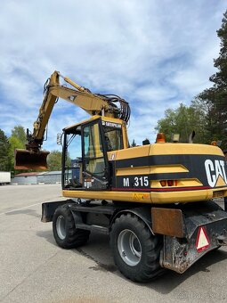 Caterpillar M 315 - 13