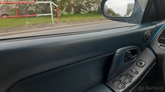 Mazda 323F BA 1995 REAL Street - 13