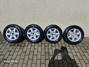 Kola škoda felicia r13 - 13