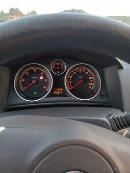 Opel Astra H kombi 1.7 Cdti 2009 - 13