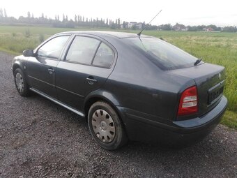 ŠKODA OCTAVIA  1. = 1,6i BENZIN 75 KW  TOUR - 13