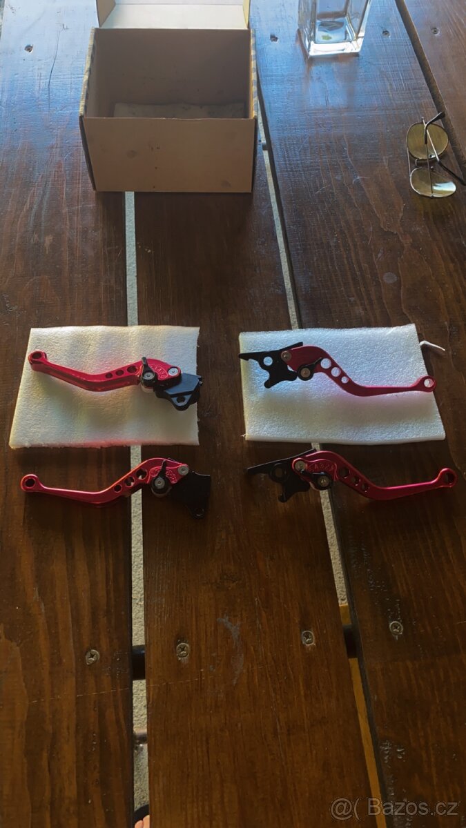 Držák na mobil,závažíčka do řídítek ,páčky - 14