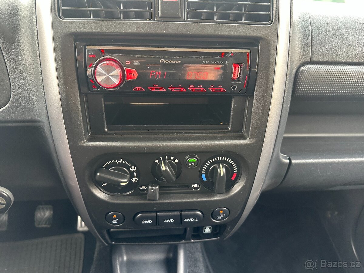 Suzuki Jimny 1.3 63kW 2018 134254km RANGER 4x4 BEZ NÁSTŘIKU - 14