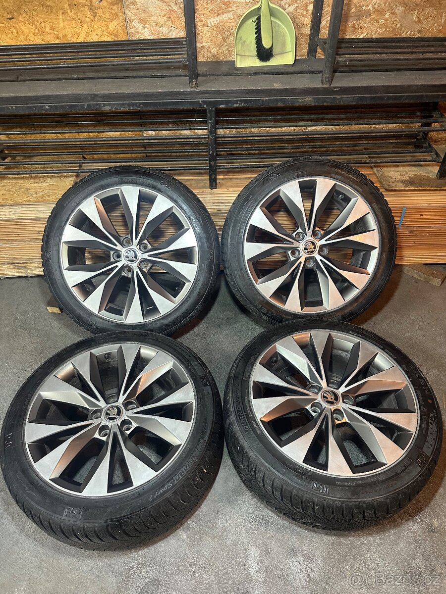 ALU Kola ŠKODA 5x112 R18 CASSIOPEIA Zimní Pneu 235/45/18 - 14