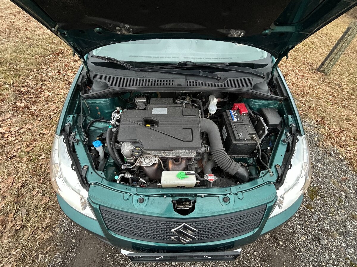 Prodám Suzuki SX4 1.6i 16V 4x4 - 14