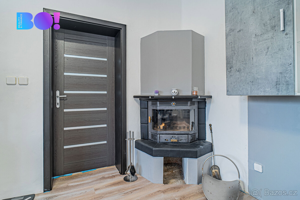 Vícegenerační rodinný dům se třemi bytovými jednotkami – Kar - 14