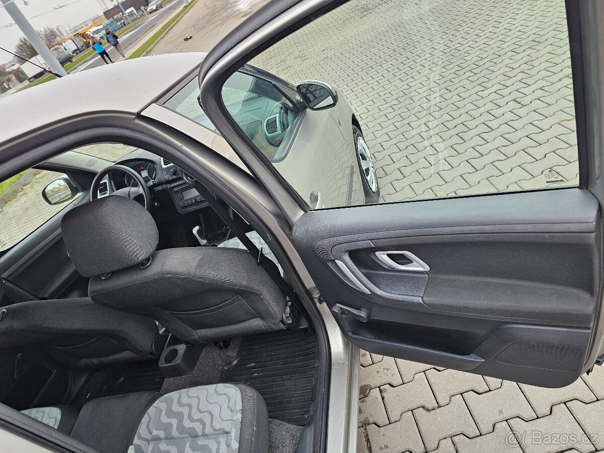 Skoda roomster 1.4 i 63kw - 14