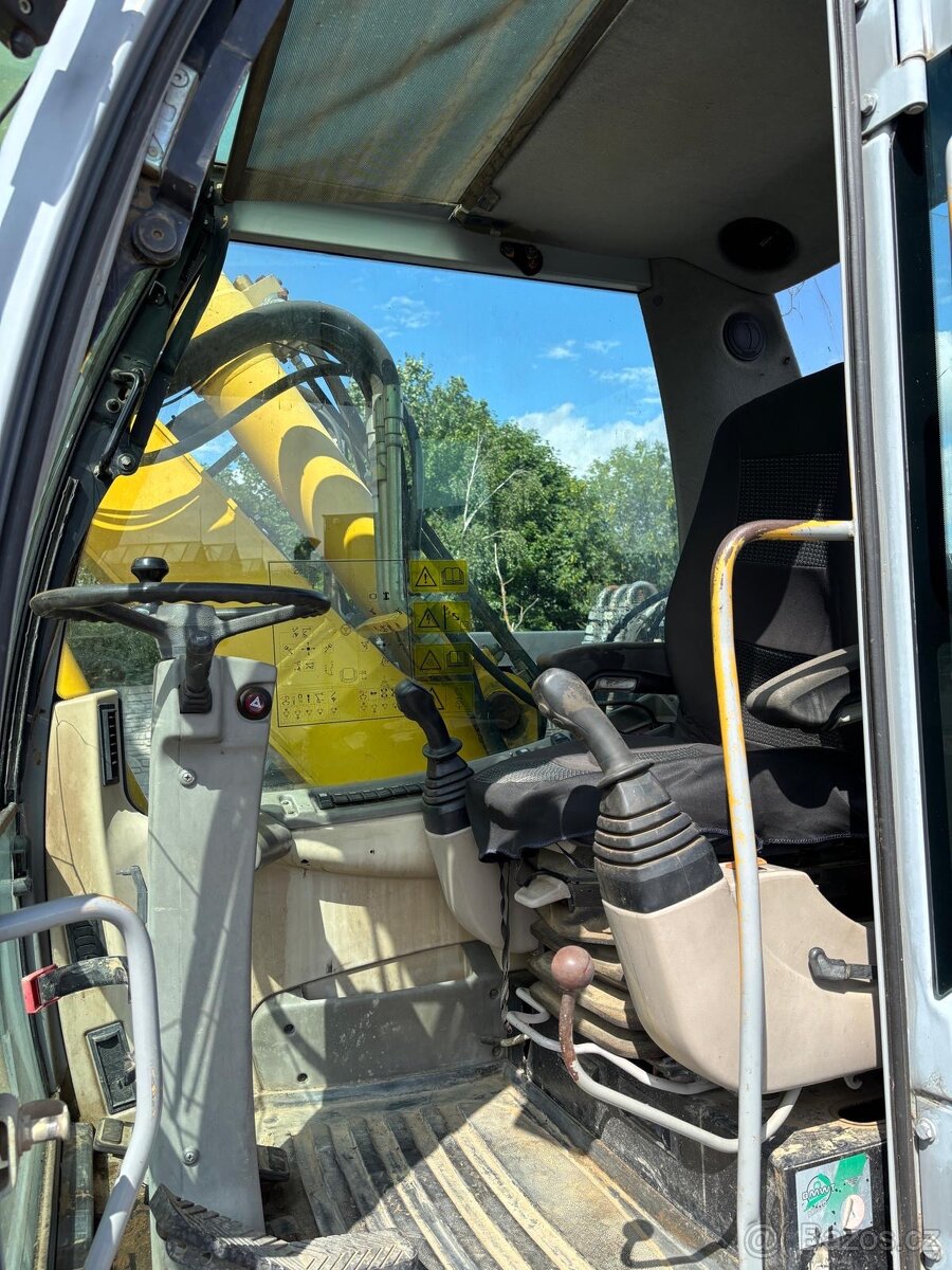 Kolové rypadlo / nakladač New Holland MH CITY - 14