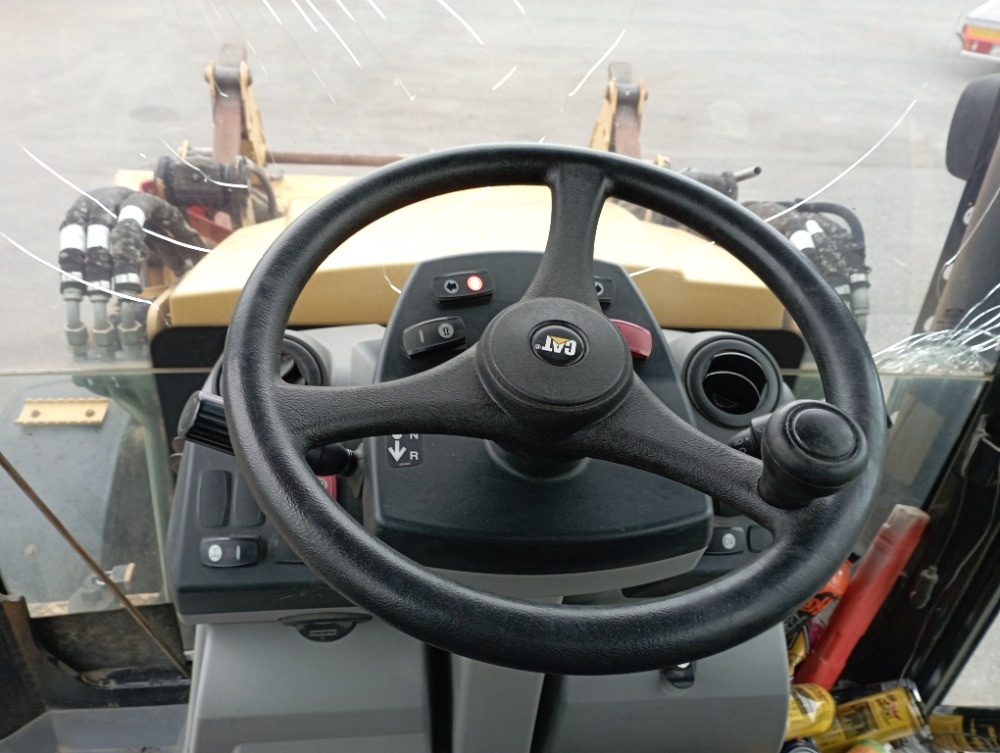 Prodám Caterpillar 428F - 14