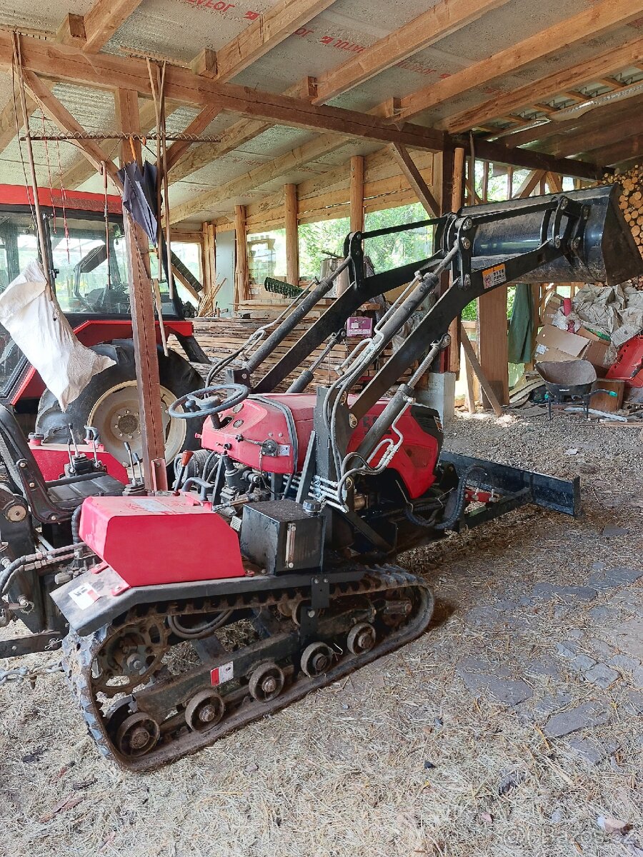 Nový multifunkční pásový traktor - 14