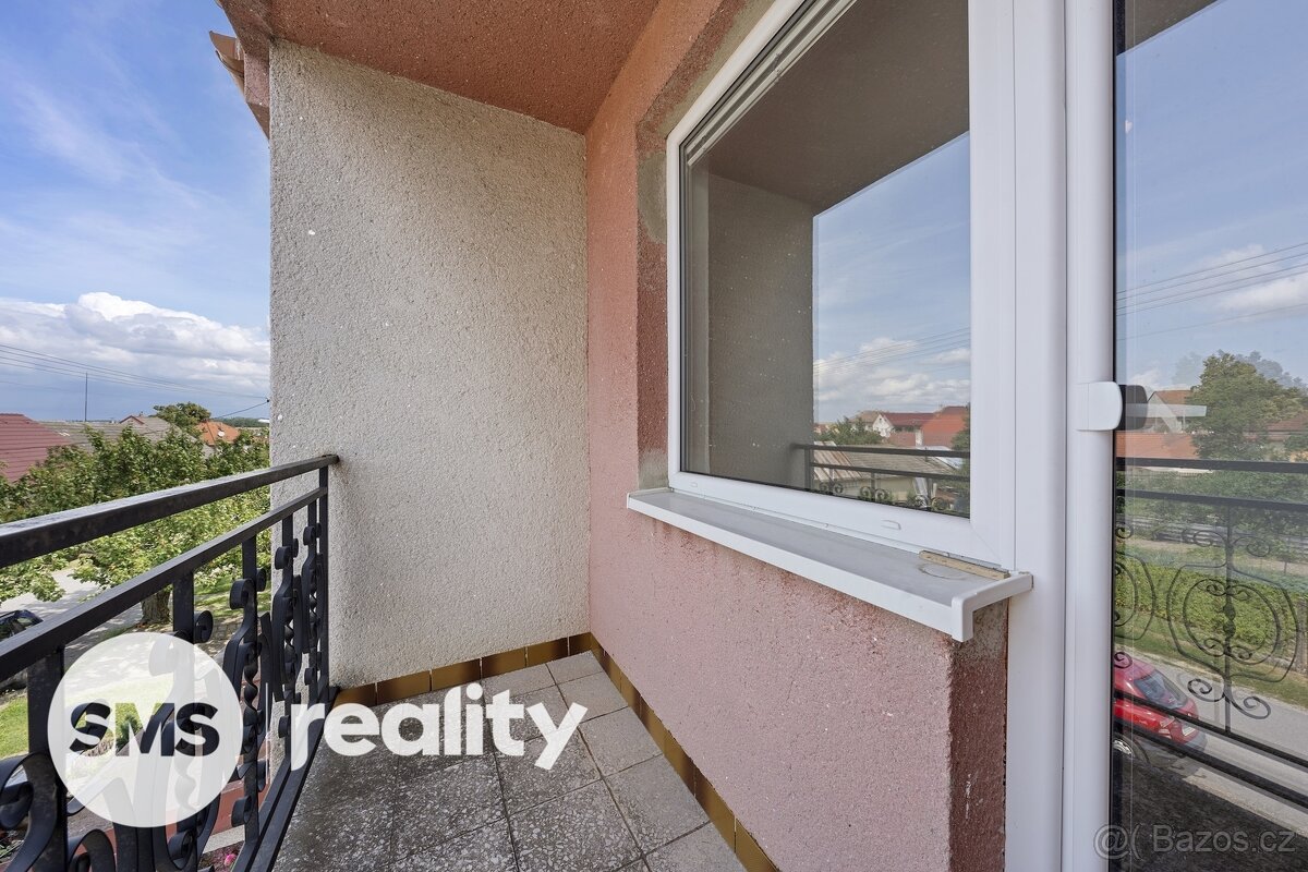 Prodej prostorného řadového domu 4+1 s garáží a zahradou – Č - 14