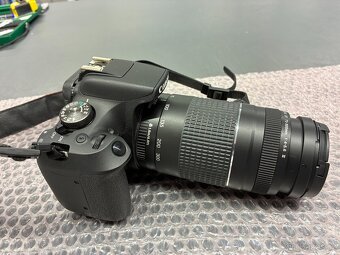 Canon EOS2000D + EF-S 18-55 mm f/3,5-5,6 + EF 75-300mm f/4-5 - 14