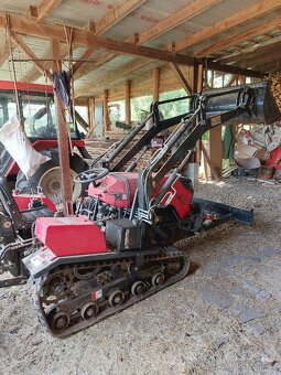 Nový multifunkční pásový traktor - 14