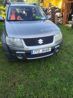 Suzuki grand Vitara 2l. Benzín 103kw 2006 - 14