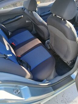 Škoda Fabia 1,4i - 14