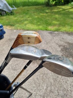 4 different Golf clubs - 14