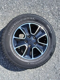 Pěkná letní orig alu kola Dacia Duster 215/65/16 vzorek 7mm - 14