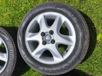 Letní sada Toyota Corolla r15 4x100 Firestone 195/60/15 - 14