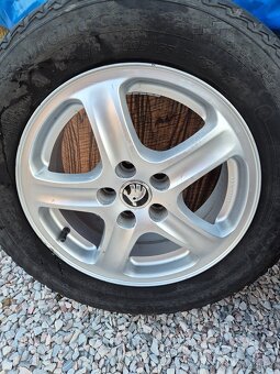 Kompletní kola Škoda Octavia, 5x100, 195/65 R15 - 14