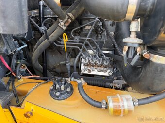 Smykový nakladač New Holland LS170 - 14