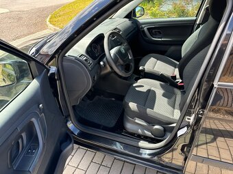 Škoda Fabia II 1.2 TSI / 63kW / 2011 /  KLIMA / DVĚ SADY KOL - 14