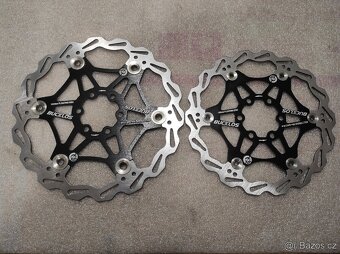 Spousta nových brzdových kotoučů 6 děr a CL. - 14