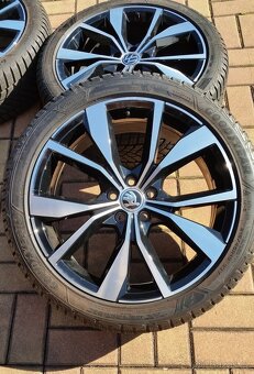 Zimní sada VOLKSWAGEN / ŠKODA 5x100 R18 pneu 215/45/18 4x9mm - 14